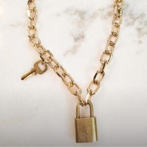 Louis Vuitton authentic lock and key on chain